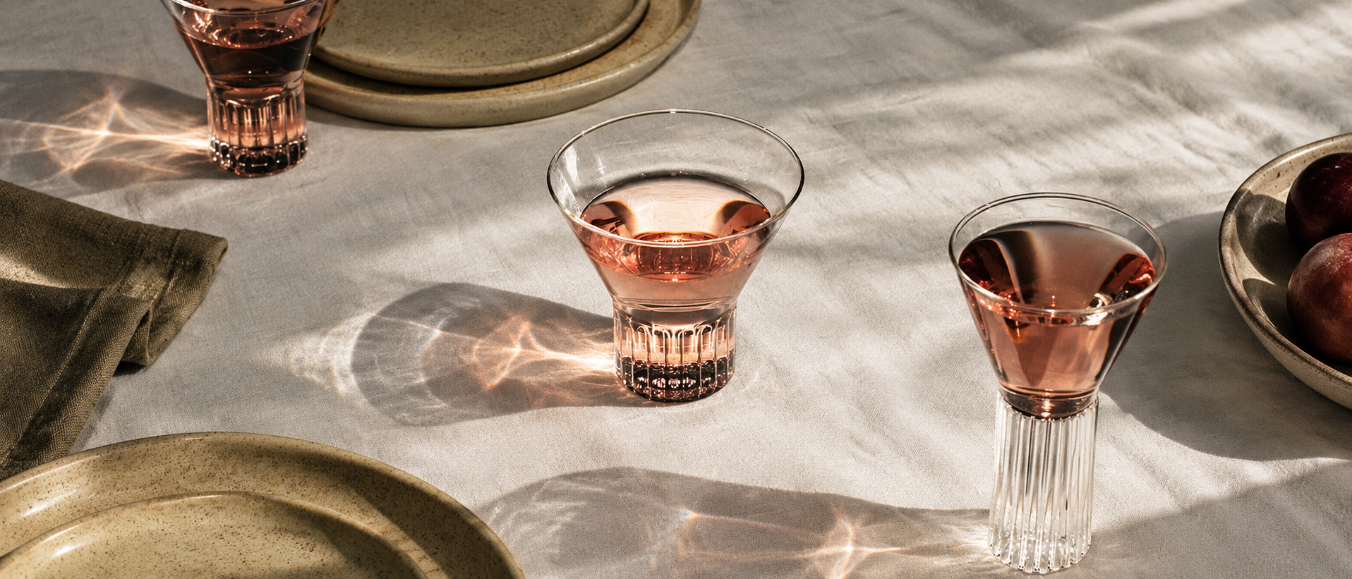 Colorful glassware arranged for everyday drinks
